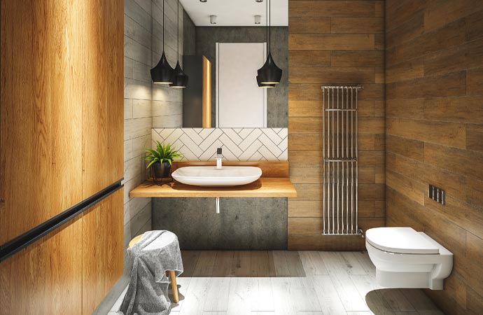 Wooden floor tiles in a bathroom, creating a warm and inviting atmosphere.
