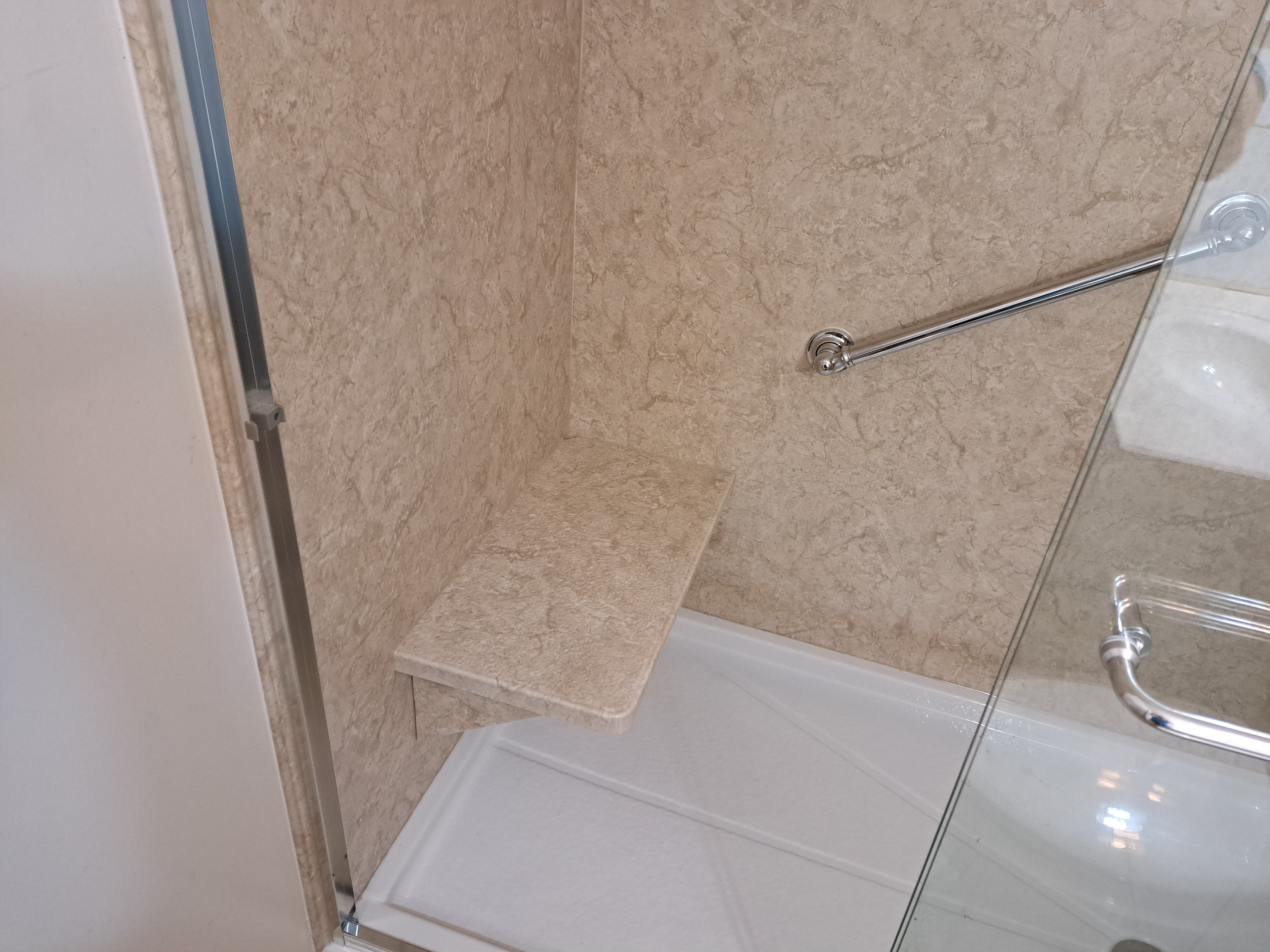 Shower seat and grab bar