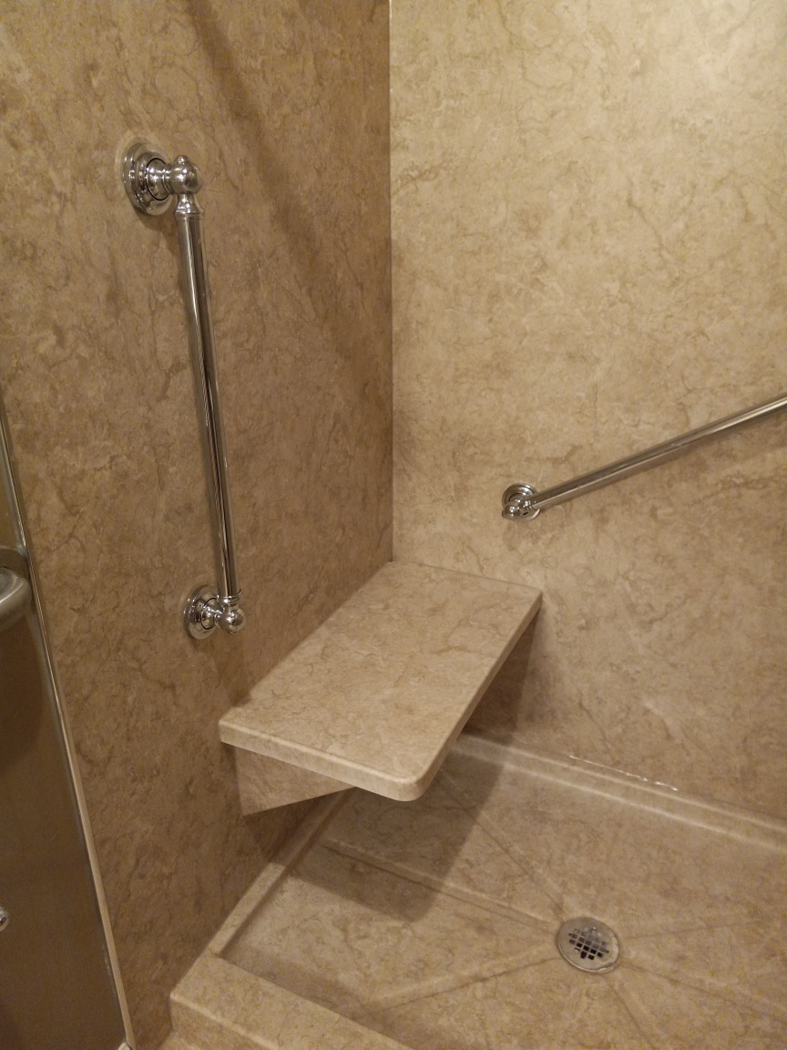 Shower bench with grab bars in close proximity