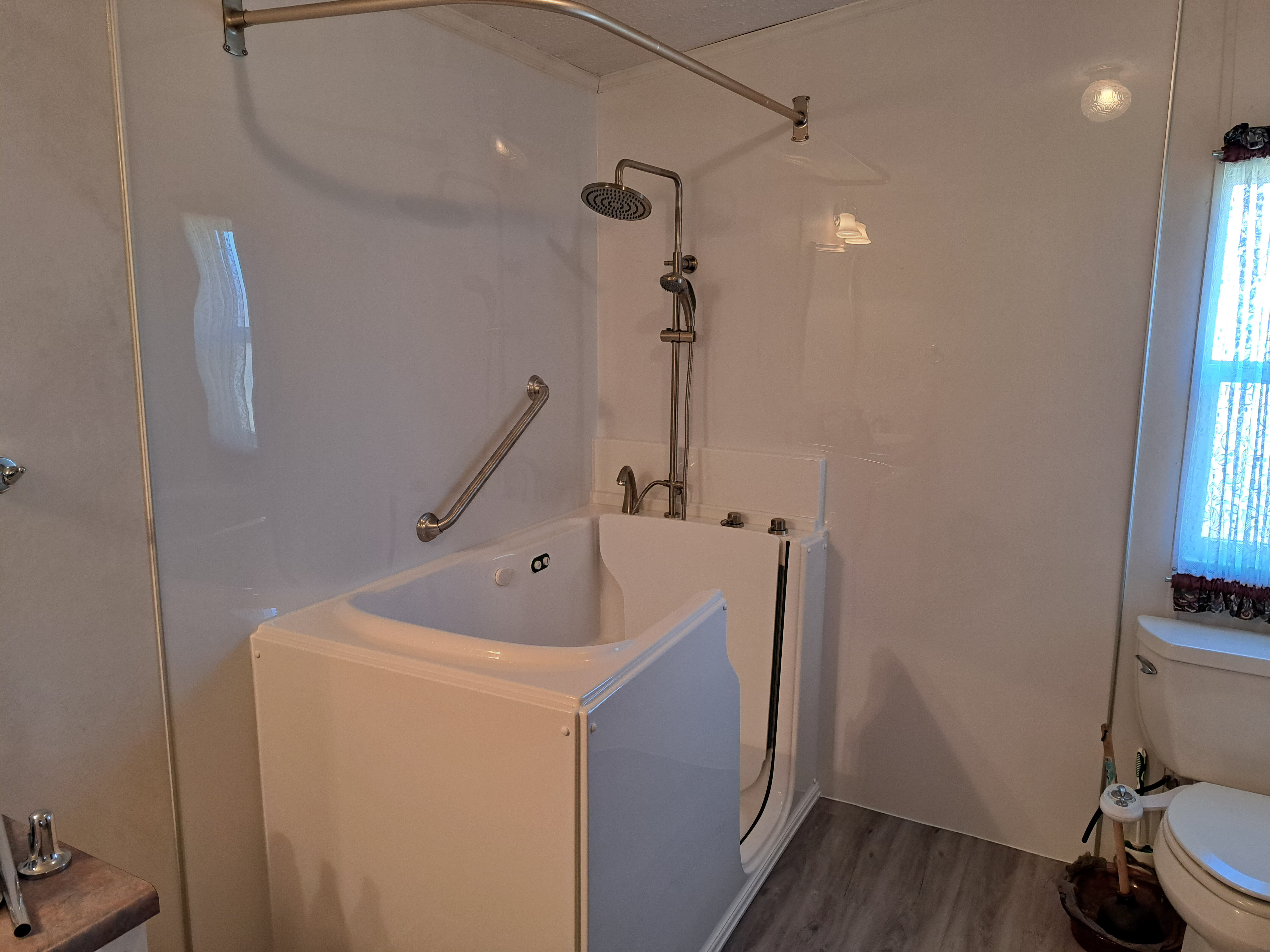 New walk in tub with shower head