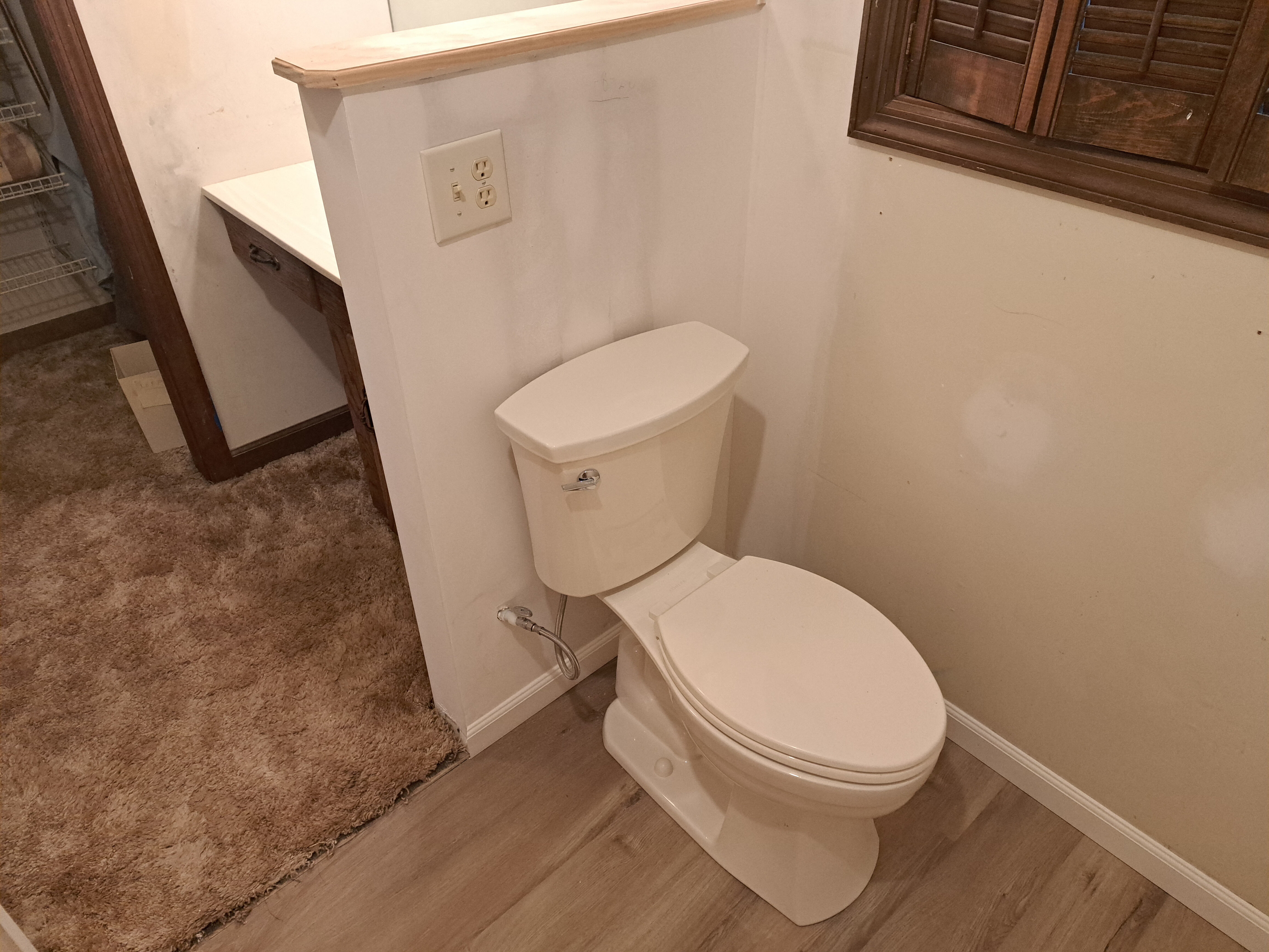 New toilet and flooring