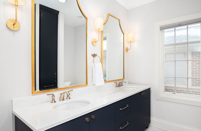 Maximize bathroom space with smartly positioned sconces and mirrors in your remodel.