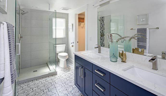 Remodeled bathroom with modern design and elegant fixtures.